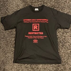 Vetements Black Tee with Bold Red Graphic